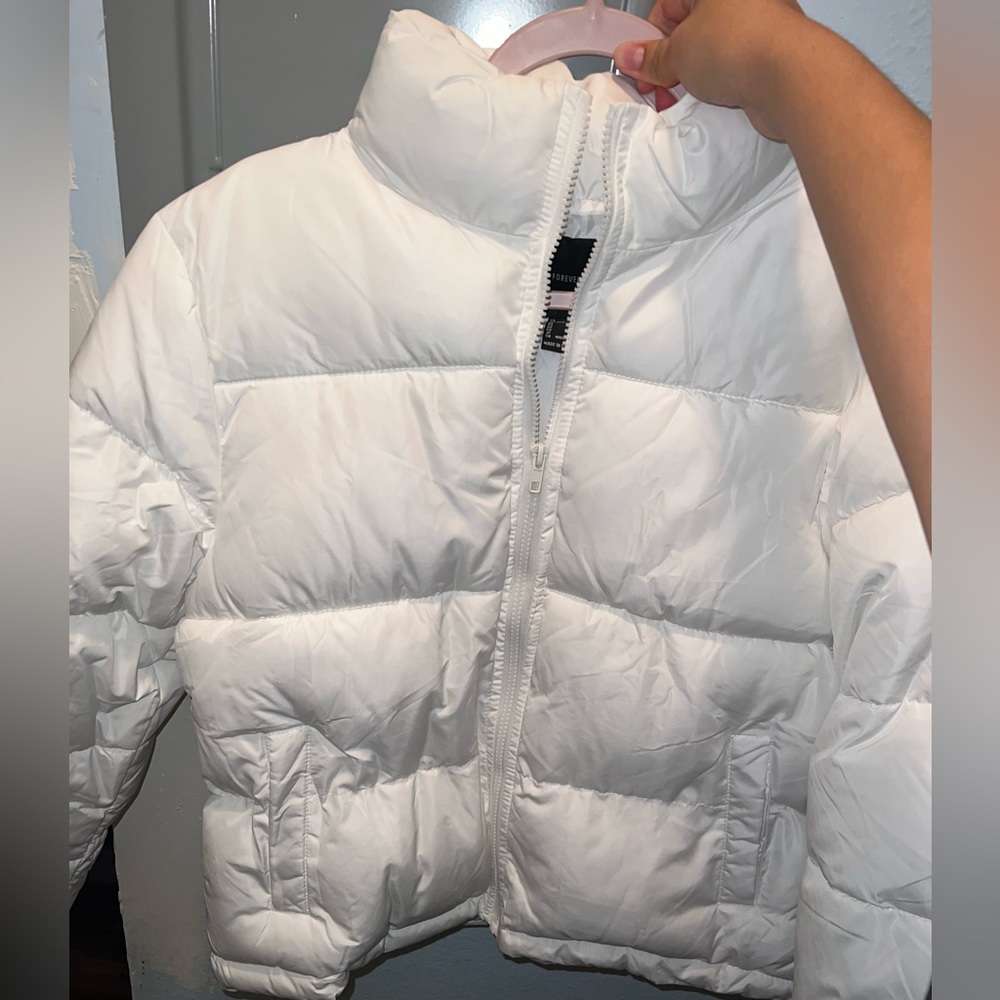 White puffer jacket with pockets I also have a black one